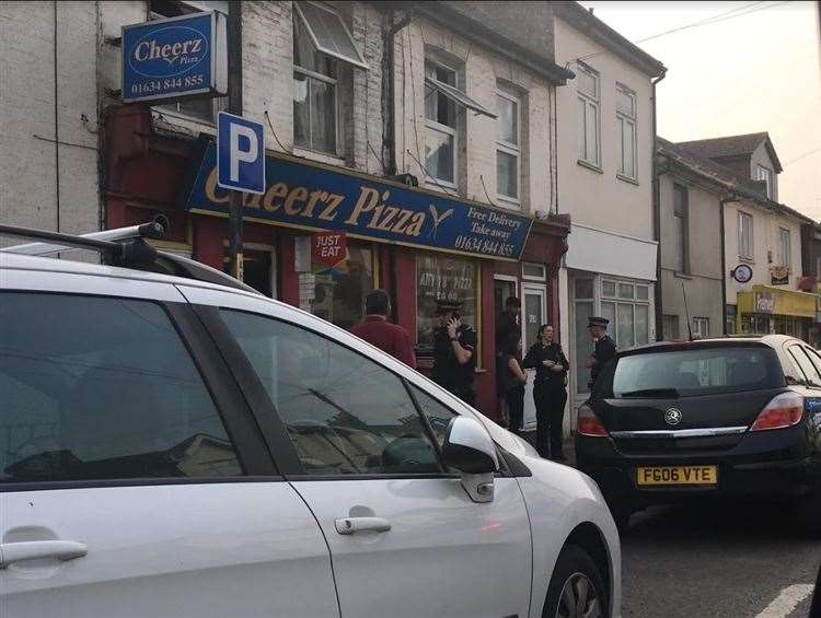 Police were seen outside Cheerz Pizza in Luton Road, Chatham. (8415911)