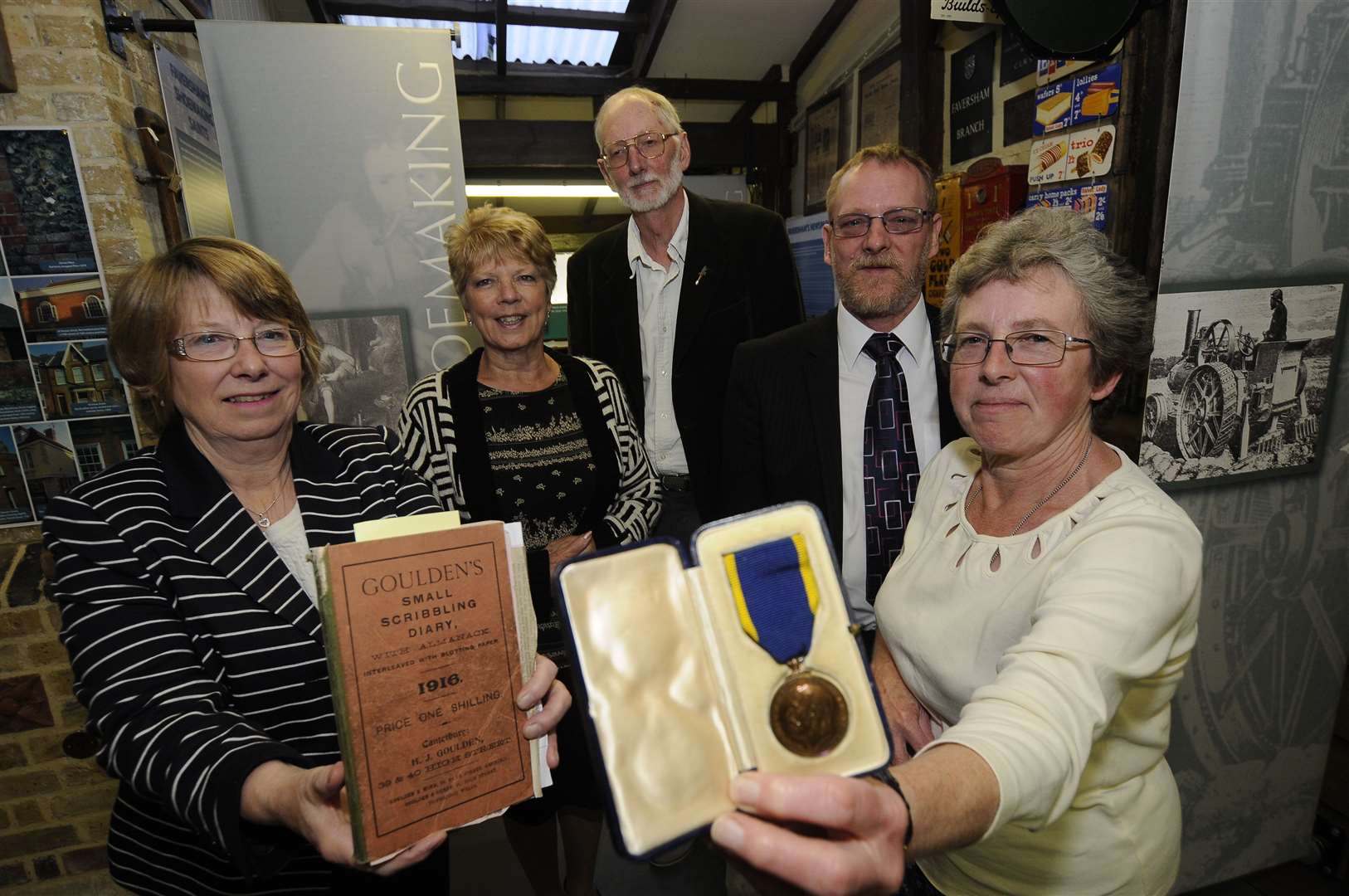 The family of John Harrison, a fireman who risked his life in 1916, with his Edward Medal - the civilian equivalent of the Victoria Cross. Here, his relatives donate the medal to the Fleur de Lis Museum in 2015