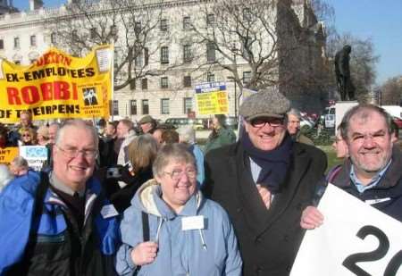FIVE-YEAR FIGHT: Andrew Parr, left, with his wife Alison and MP Derek Wyatt, second from right, during a pensions protest involving former Sheerness steel mill workers in Parliament Square
