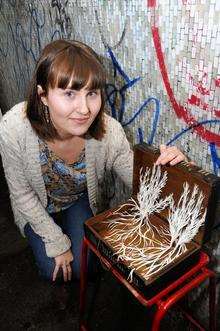 Kirsty Ashby, 22, and her box of hands in the St George's subway