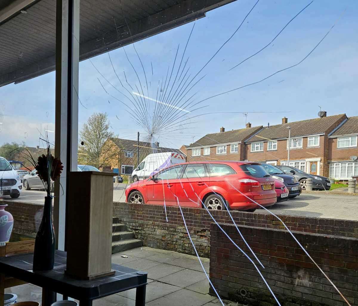 A large crack can be seen on the shop's window in Strood. Picture: RSPCA