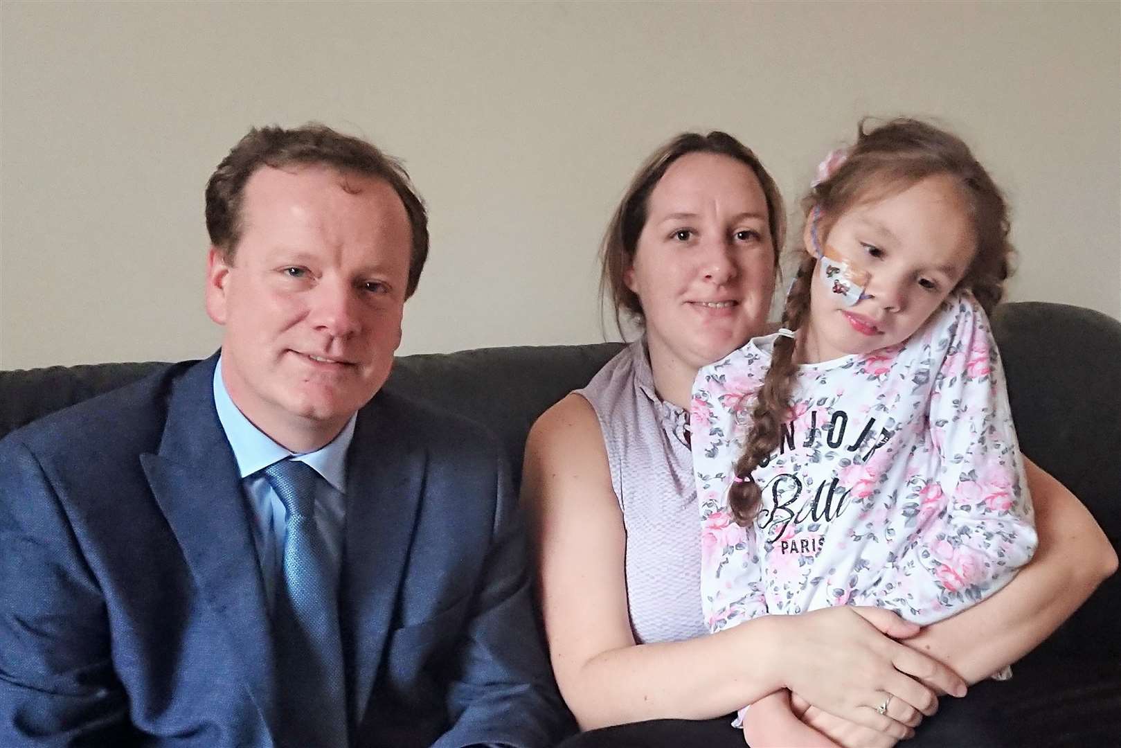 Charlie Elphicke with Emma and Teagan Appleby at their Aylesham home