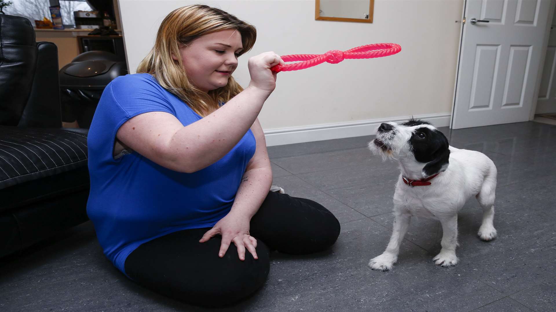 Shannon Funnell and dog Dexter who is making a recovery after eating his frisbee. Picture: Martin Apps