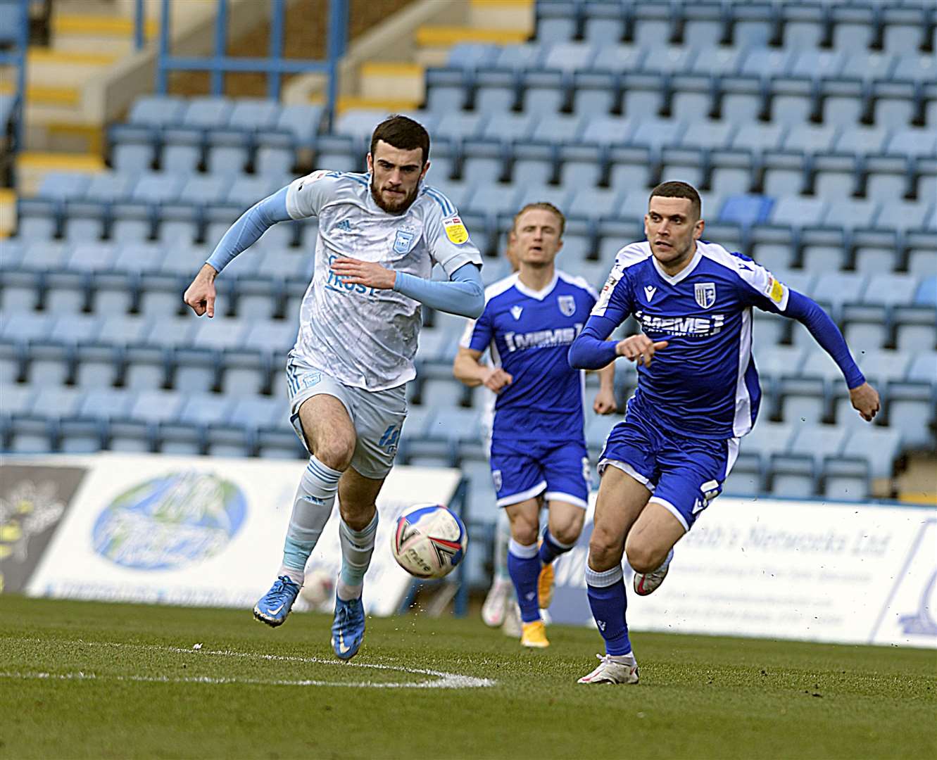 Stuart O'Keefe makes chase as teammate and captain Kyle Dempsey looks on against Ipswich Town Picture: Barry Goodwin