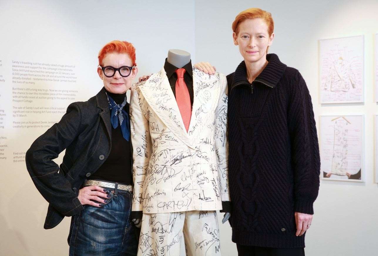 Sandy Powell and Tilda Swinton with the suit at the auction launch