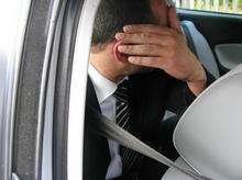 Tim Blake-Bowell hides his face on the way to court