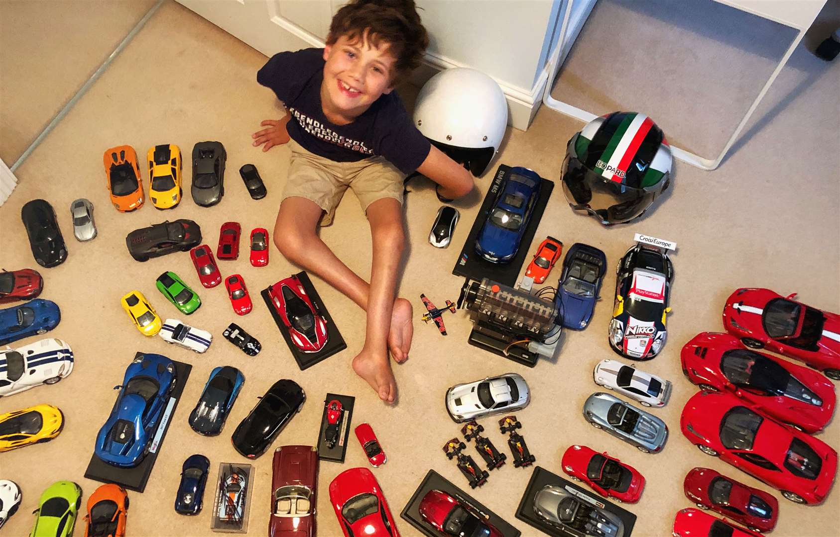 Matt surrounded by his car models in his Kings Hill home