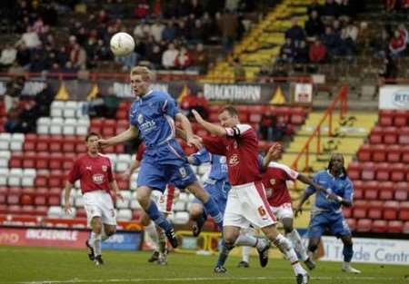 Gary Mulligan in aerial action at Ashton Gate. Picture: ANDY PAYTON