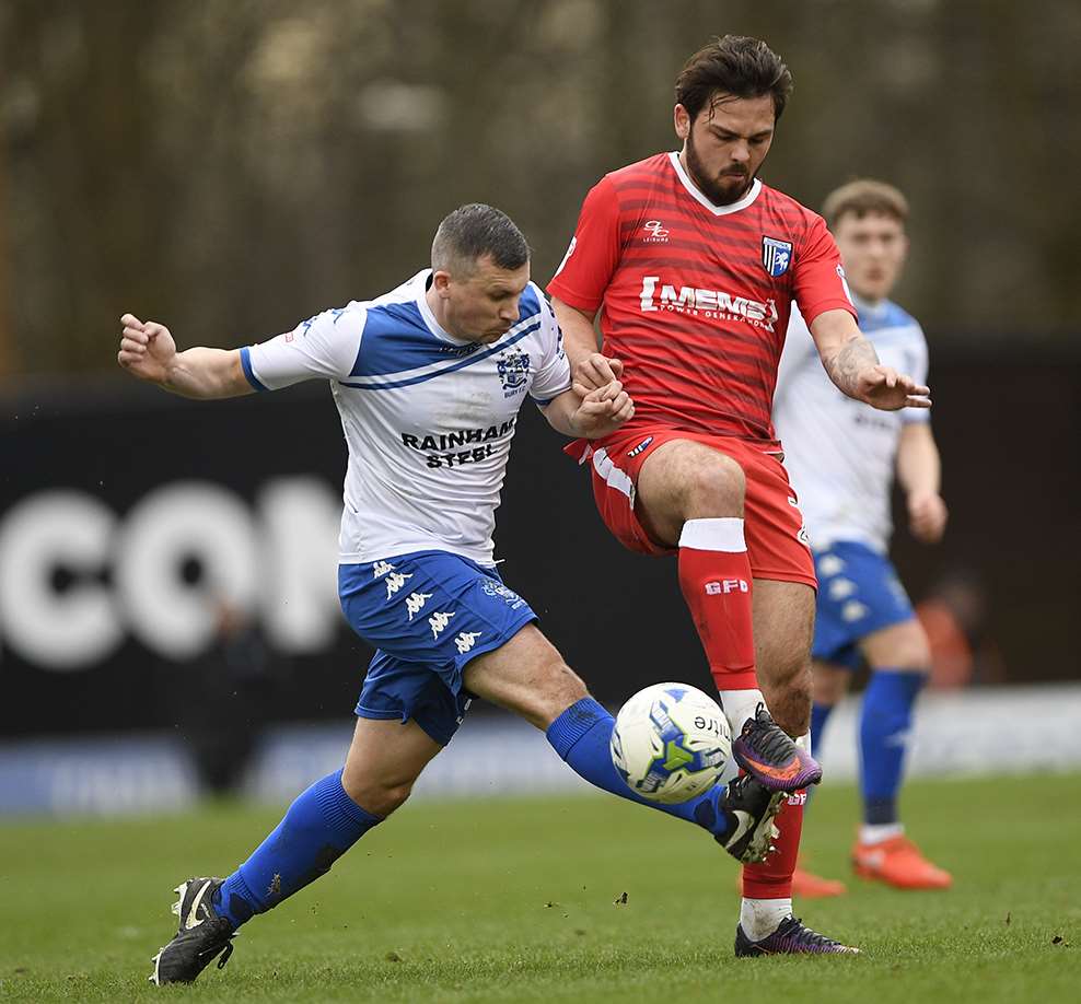 Bradley Dack battles for the ball Picture: Ady Kerry