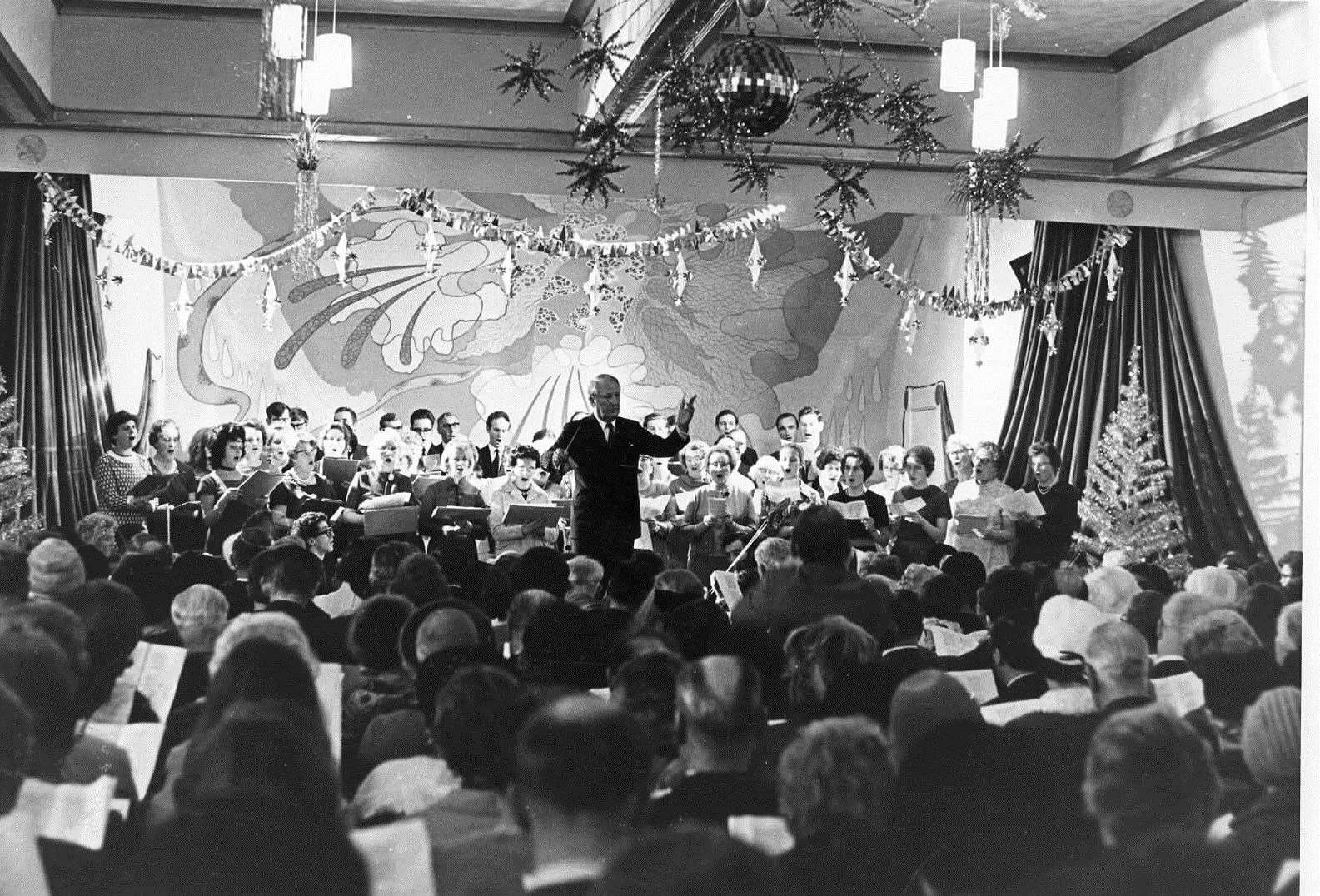 Ted Heath, now Prime Minister, conducting Broadstairs carol service in December 1970