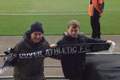 Harry with his father Ben at a Dover vs MK Dons game. His cousin Luca McKnight is on the left.