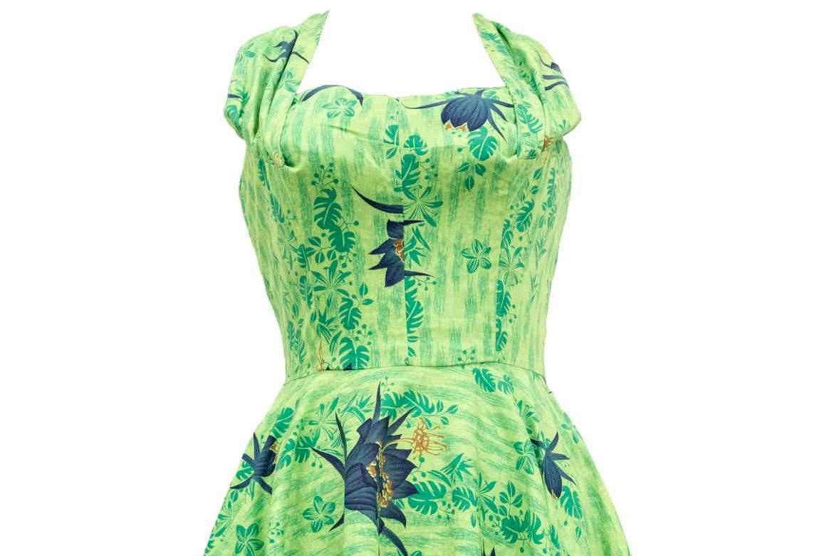 Kelly Brook is selling a 1960s Green cotton Hawaiian halter dress, labelled Kamehameha. Picture: SWNS