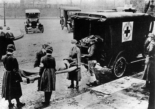 American Red Cross volunteers carry a Spanish flu victim, 1919