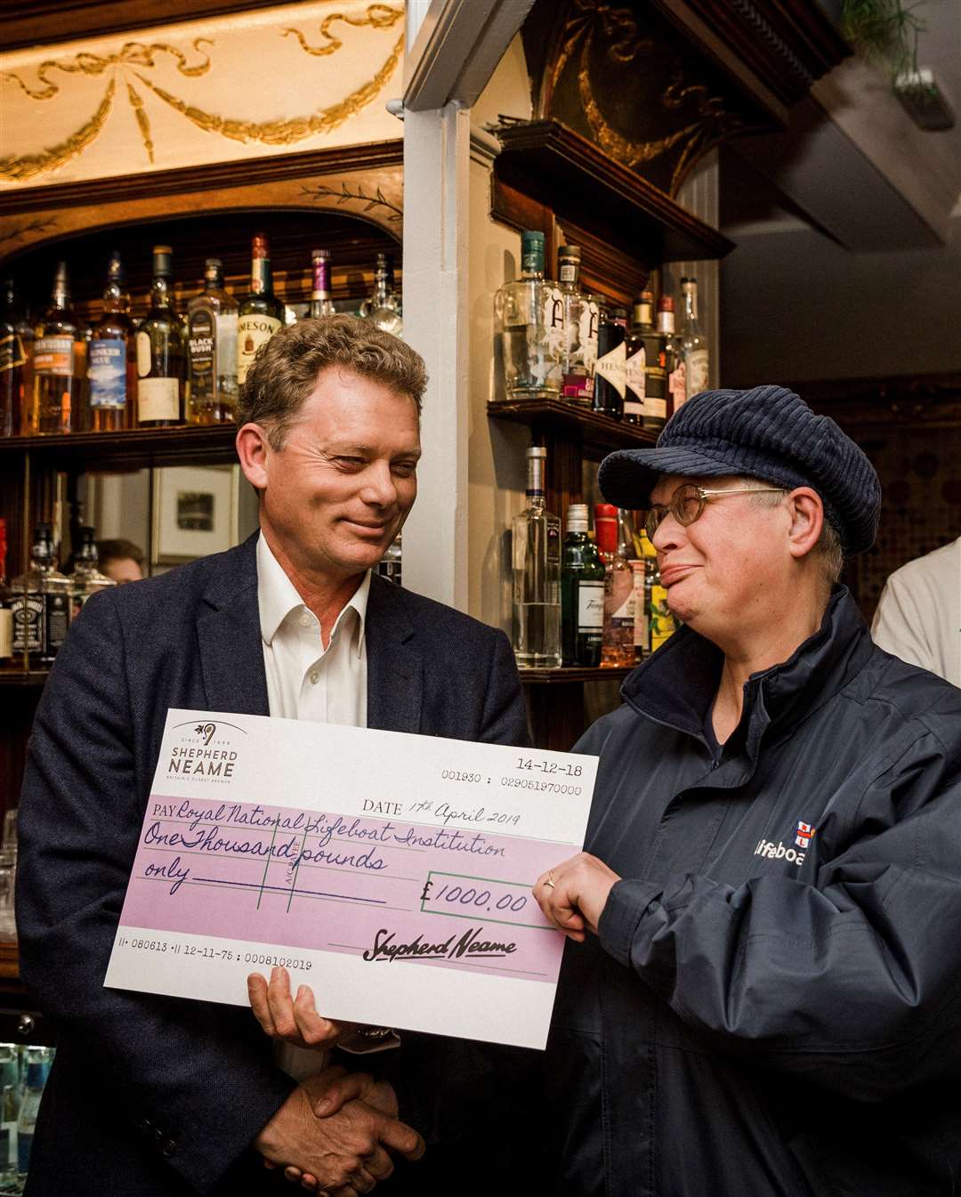 Neptunes Hall in Broadstairs official reopening marked by Shepherd Neame Chief Executive Jonathan Neame presentiing a cheque for £1,000 to the RNLI (9196991)