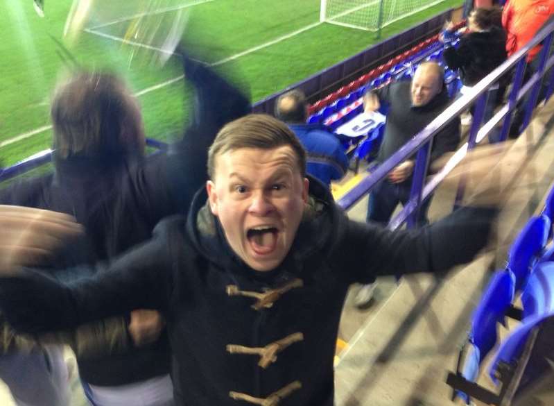 Gills fan Chris Ray celebrates a goal