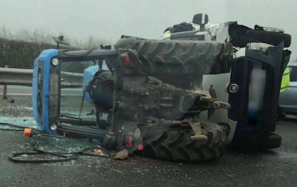 The crash left a tractor on its side