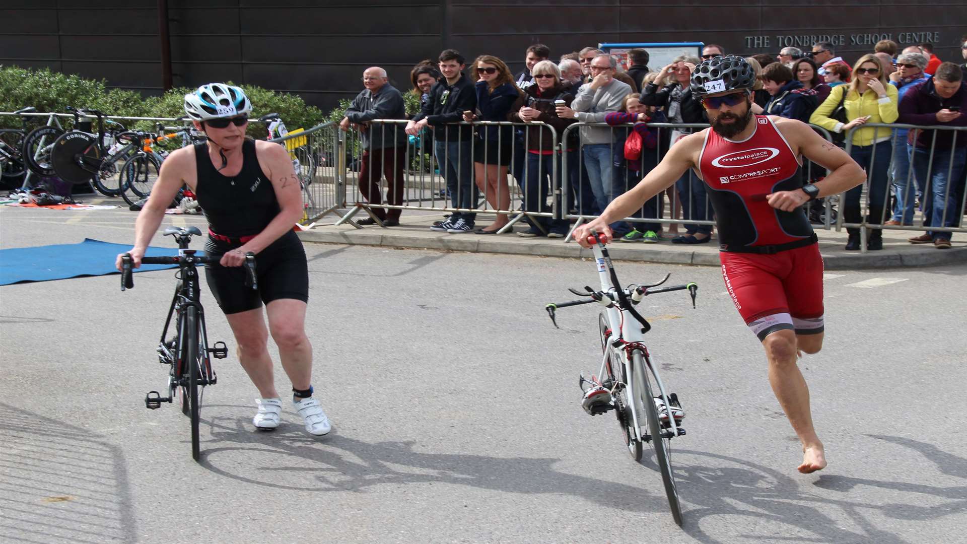 Two athletes prepare to start the cycle discipline