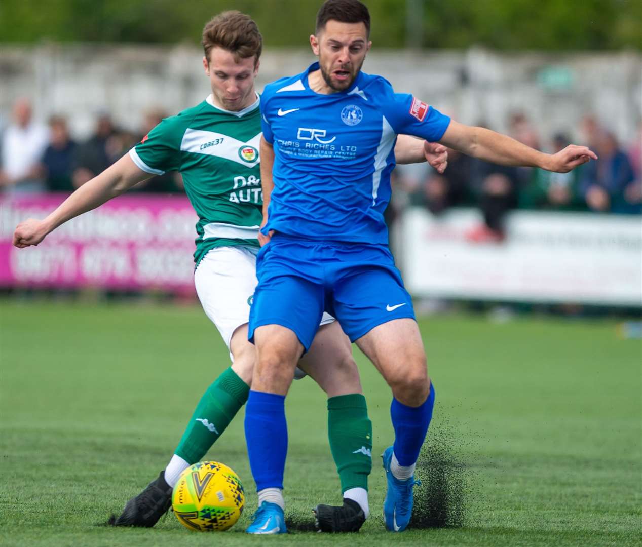 Mike West, on loan at Herne Bay from Ebbsfleet, tussles for the ball with Ashford's Josh Wisson. Picture: Ian Scammell