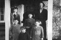 An old photograph of teacher and children at Steephill School