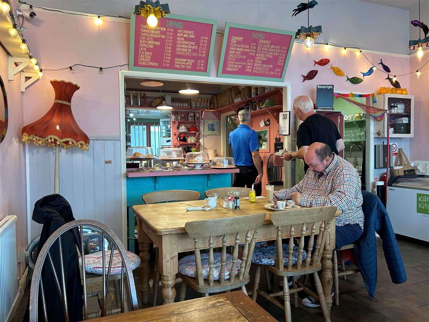 The Dog House in Sandgate has about five tables and is decorated in pastel colours