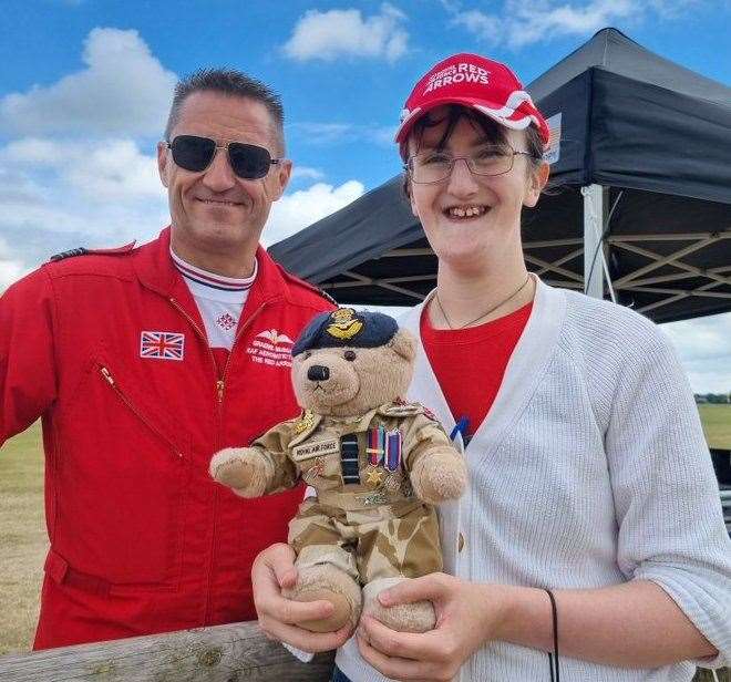 Red Arrows Squadron Leader Grahame Muscat, Wing Commander Gideon Bland the bear, and Ellie Crook at Headcorn Aerodrome raising awareness of The Royal Bear Force and its work with children's mental health. Picture: @0013ellie