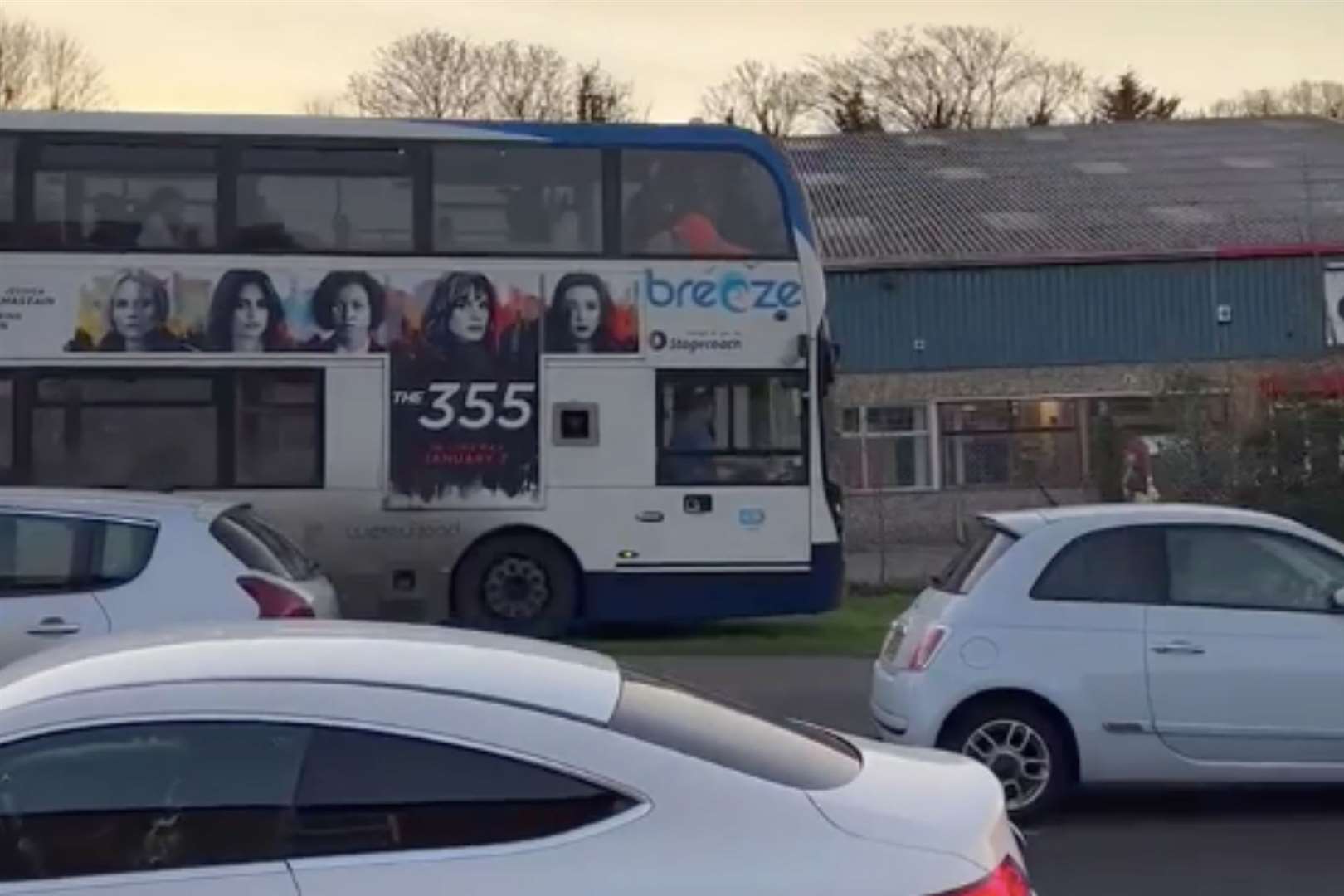 The coach was caught on camera leaving the road to avoid a jam