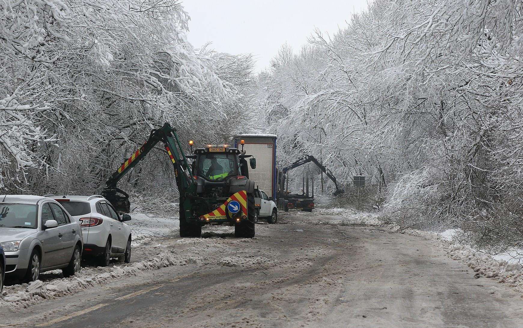 Work continues to clear Walderslade Woods Road. Picture: Mike Mahoney (6928390)