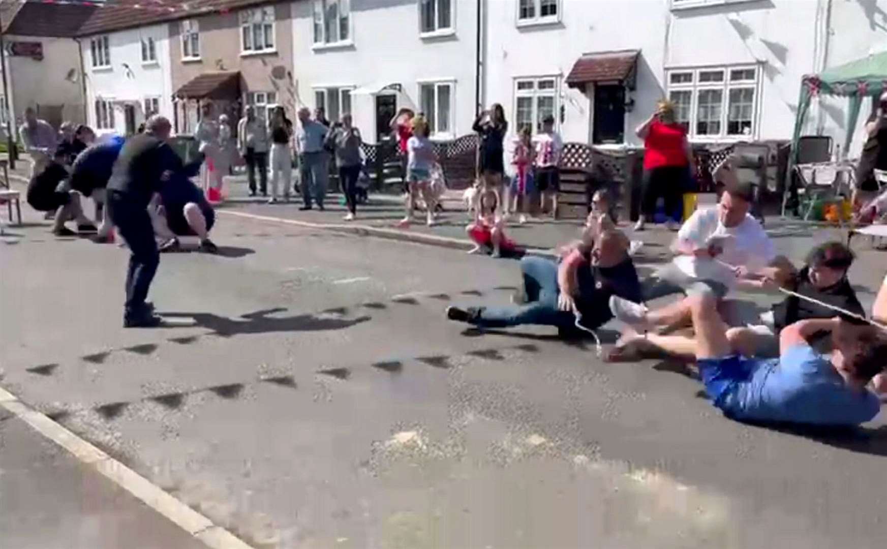 More than 10 men were left with sore elbows after a rope suddenly snapped during their game of tug-of-war. Picture: SWNS