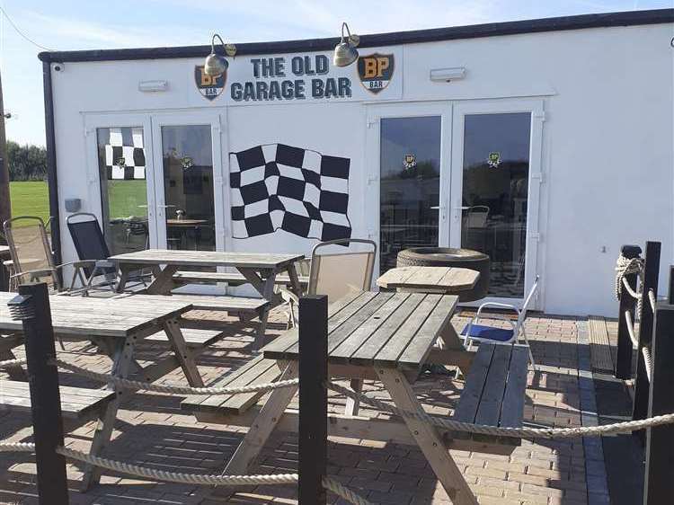 A licensing bid to open a function room at the Old Garage Bar, Hampton Bay Park, has been approved