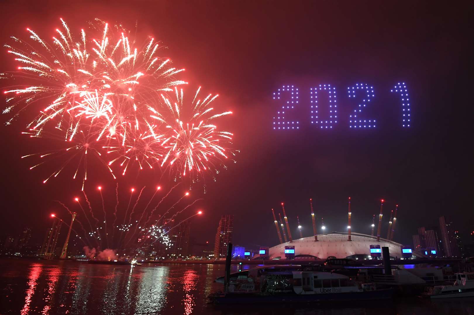 Fireworks and drones illuminate the night sky over the The O2 Arena (Victoria Jones/PA)