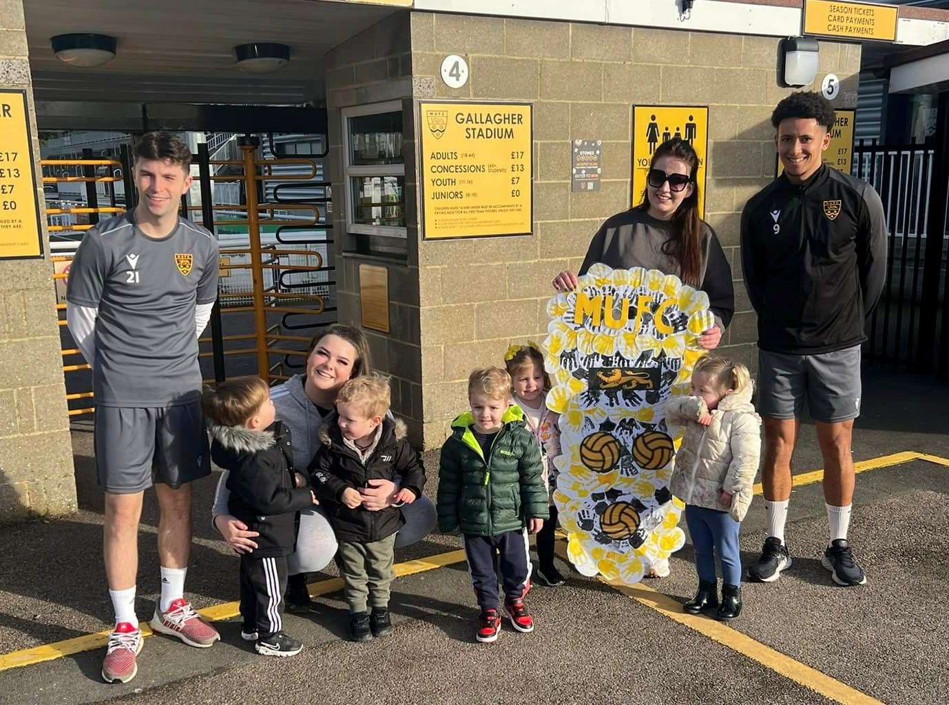 Children and staff from Willows Adventures pictured with midfielder Conor Kelly, left, and forward Sol Wanjau-Smith