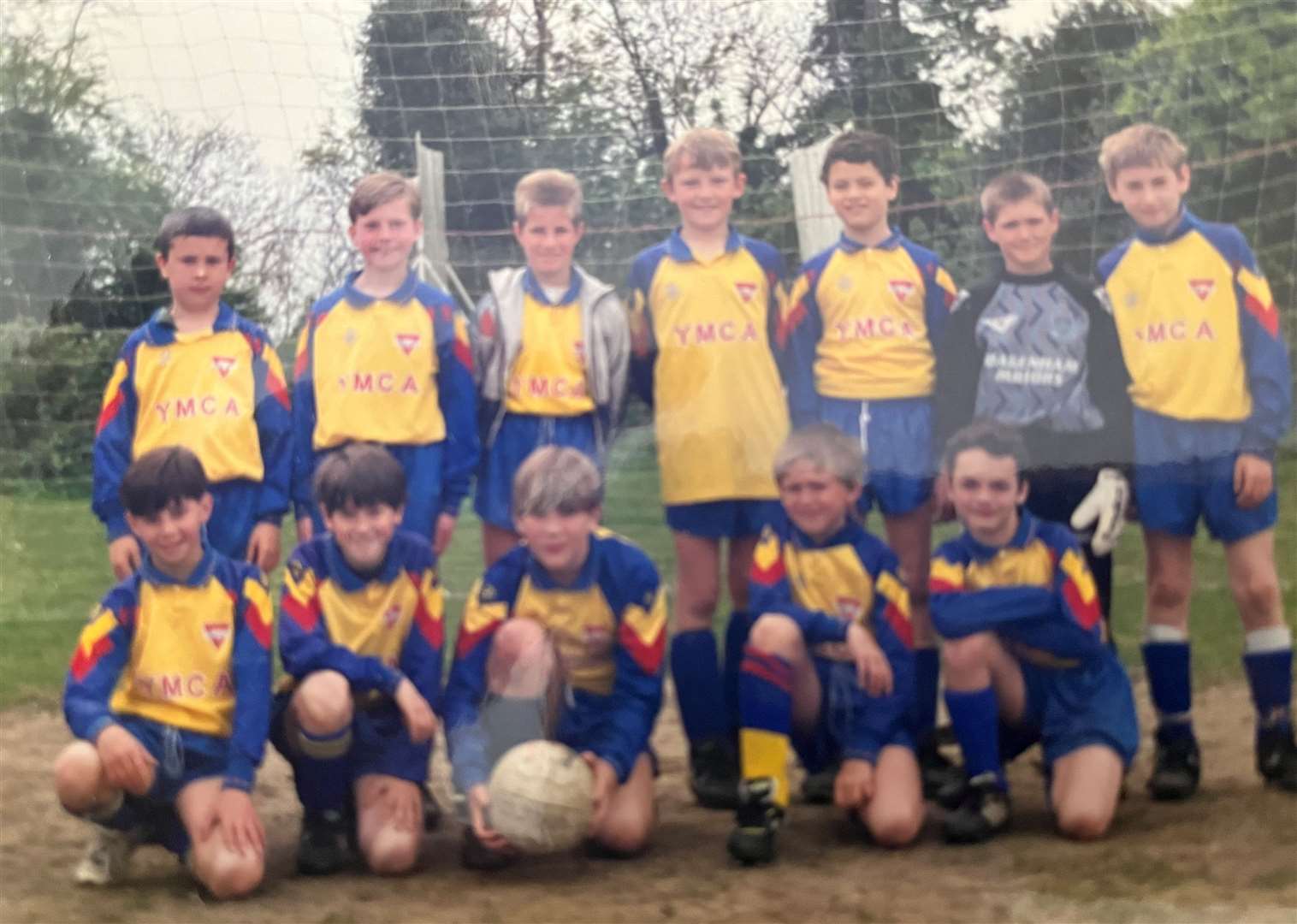 The friends played football together (Damien Clarkson second from back left and John Rendle second from left front). Photo credit: Damien Clarkson