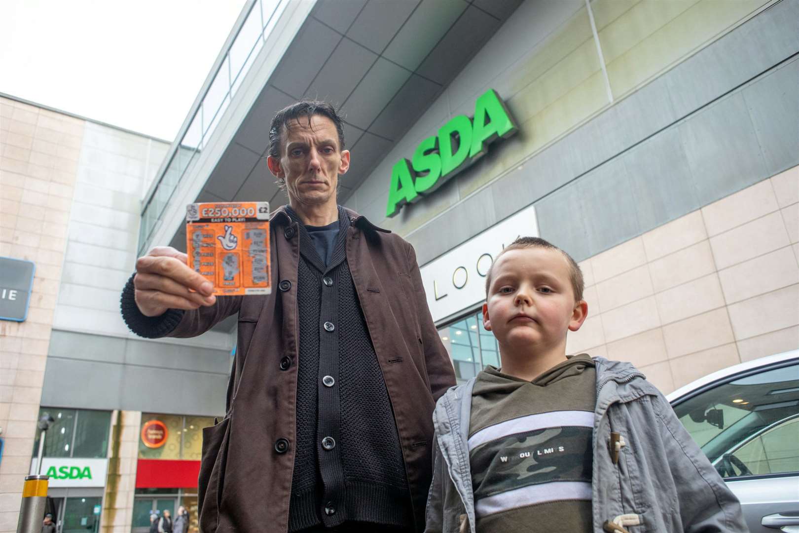 James Fletcher-Retallick, 47, said he was "shocked" son Ronnie, seven, was able to make the purchase. Picture: SWNS