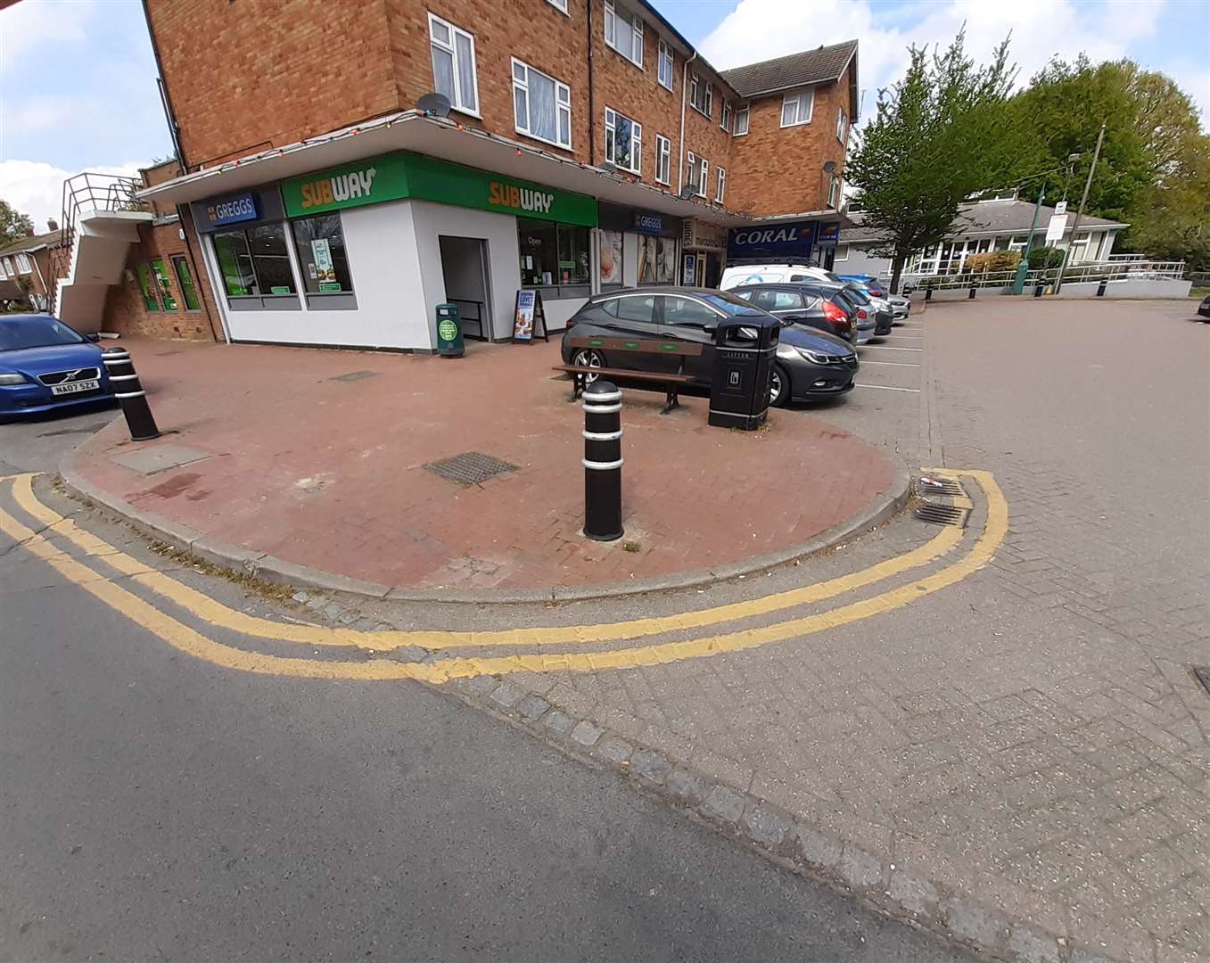 KCC has positioned bollards in the centre of four dropped kerb at The Parade in Staplehurst