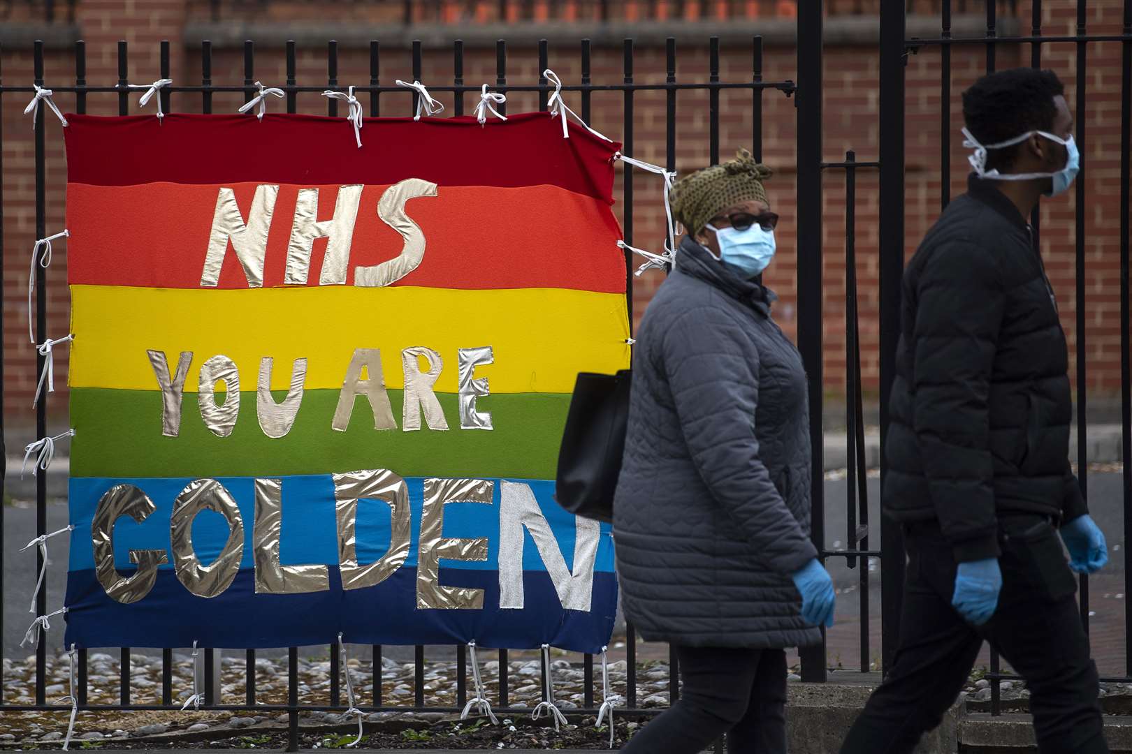 Captain Tom’s support for the NHS is being echoed around the country, as this banner opposite King’s College Hospital in south London shows (Victoria Jones/PA)