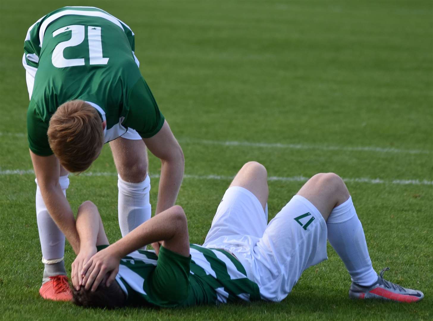 Josh James consoles Louie Clarke after his penalty miss. Picture: Alan Coomes