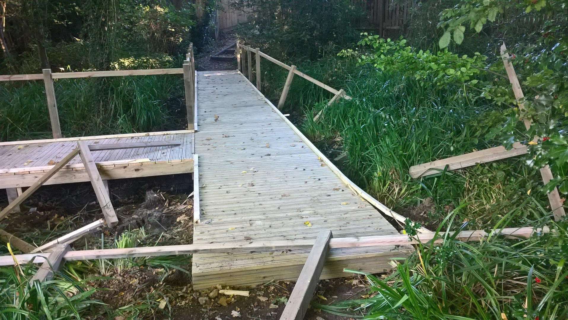 Vandals damaged the newly constructed walkway