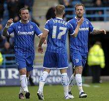 Gills celebrate their second goal against Macclesfield