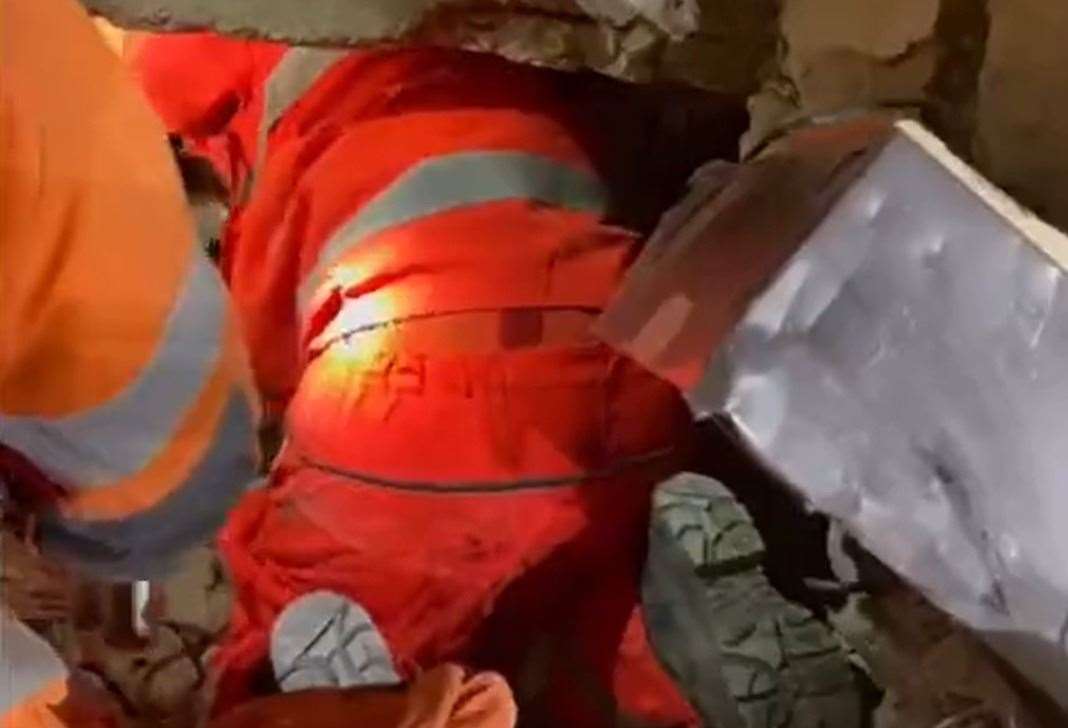 Kent Firefighters helped to save a 60-year-old woman who was trapped underneath a building after the earthquake in Turkey