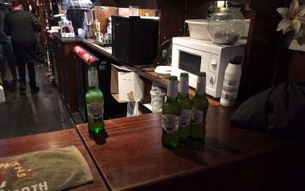 The drink of choice in the Fox & Hounds, Dartford is bottled Stella, which was stacked high in boxes behind the bar