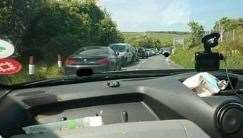 Parked cars block the highway near the National Trust at the White Cliffs of Dover. Picture Kent Police-Dover twitter