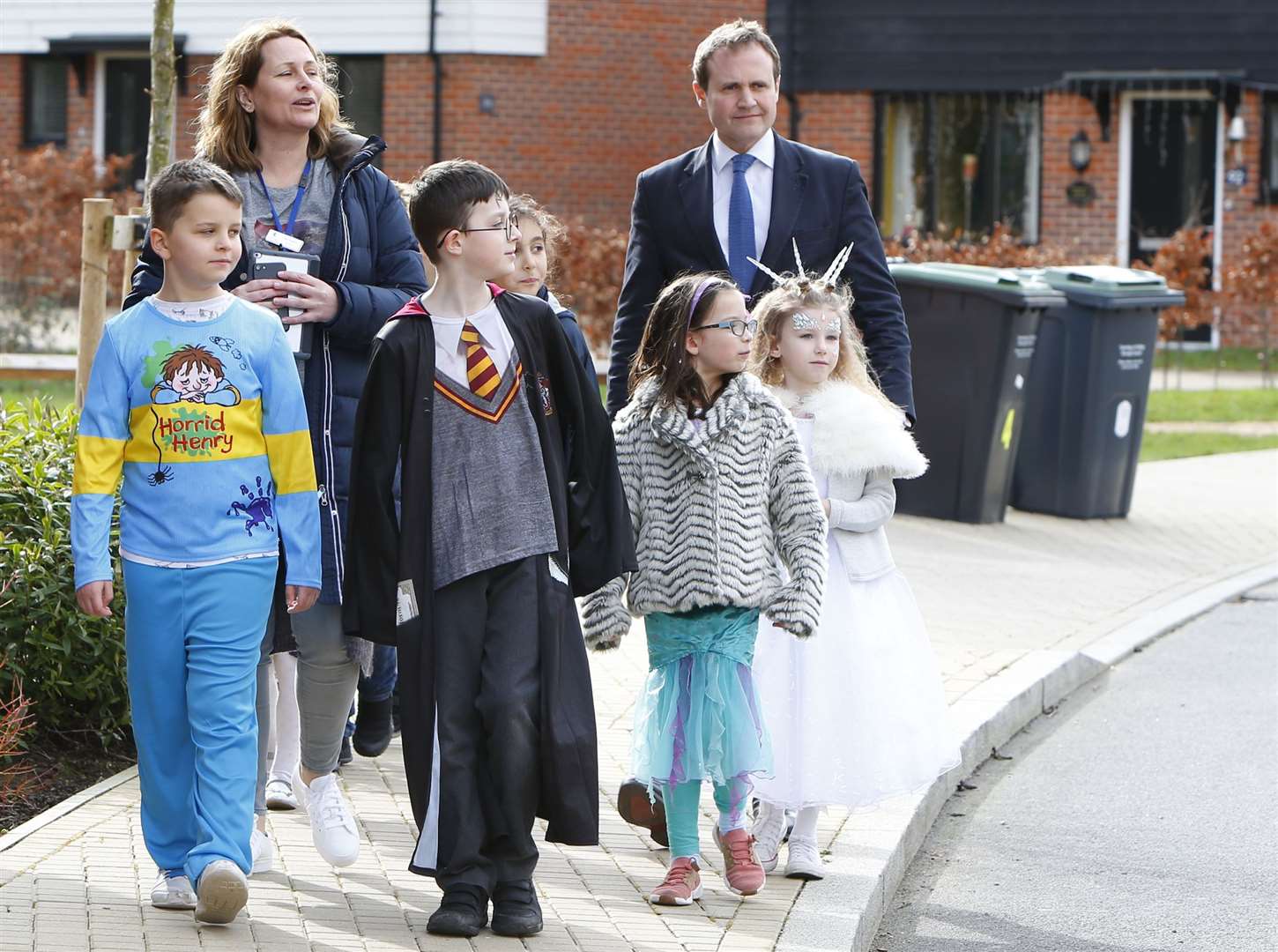 Year 3 pupils took MP Tom Tugendhat around Leybourne Chase to show off the dangers on local roads. Picture: Andy Jones (7660338)