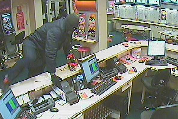A CCTV image released by police after the raid at Ladbrokes in Snodland