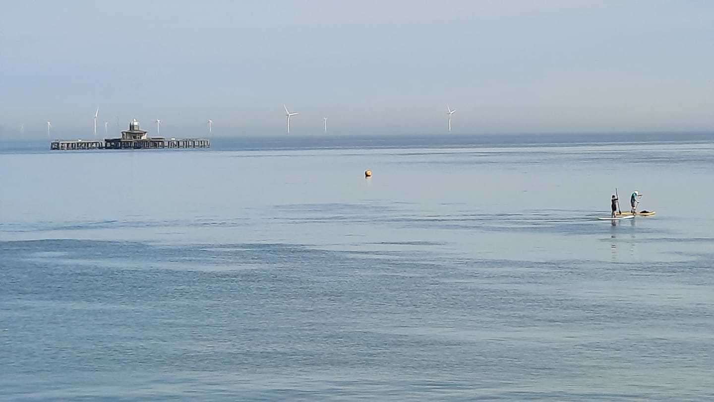 Paddleboarders off the coast of Herne Bay. Picture: John Tunsley