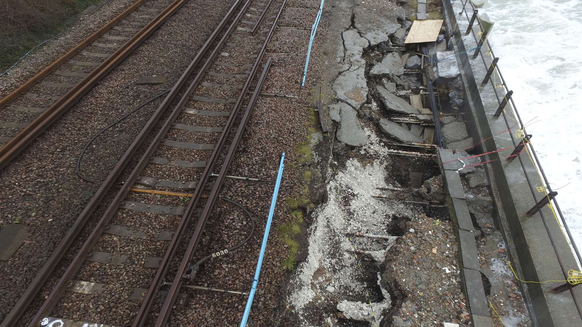 Several sinkholes have appeared as the wall collapsed. Picture: Network Rail