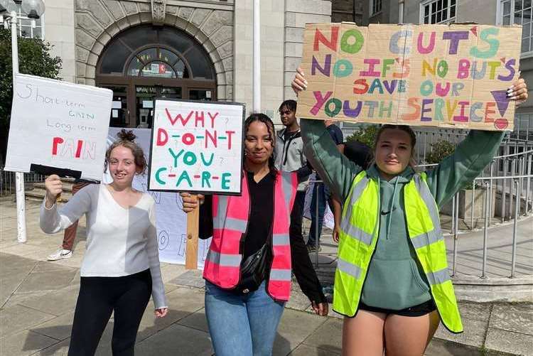 Members of the youth group protested outside County Hall over the cuts