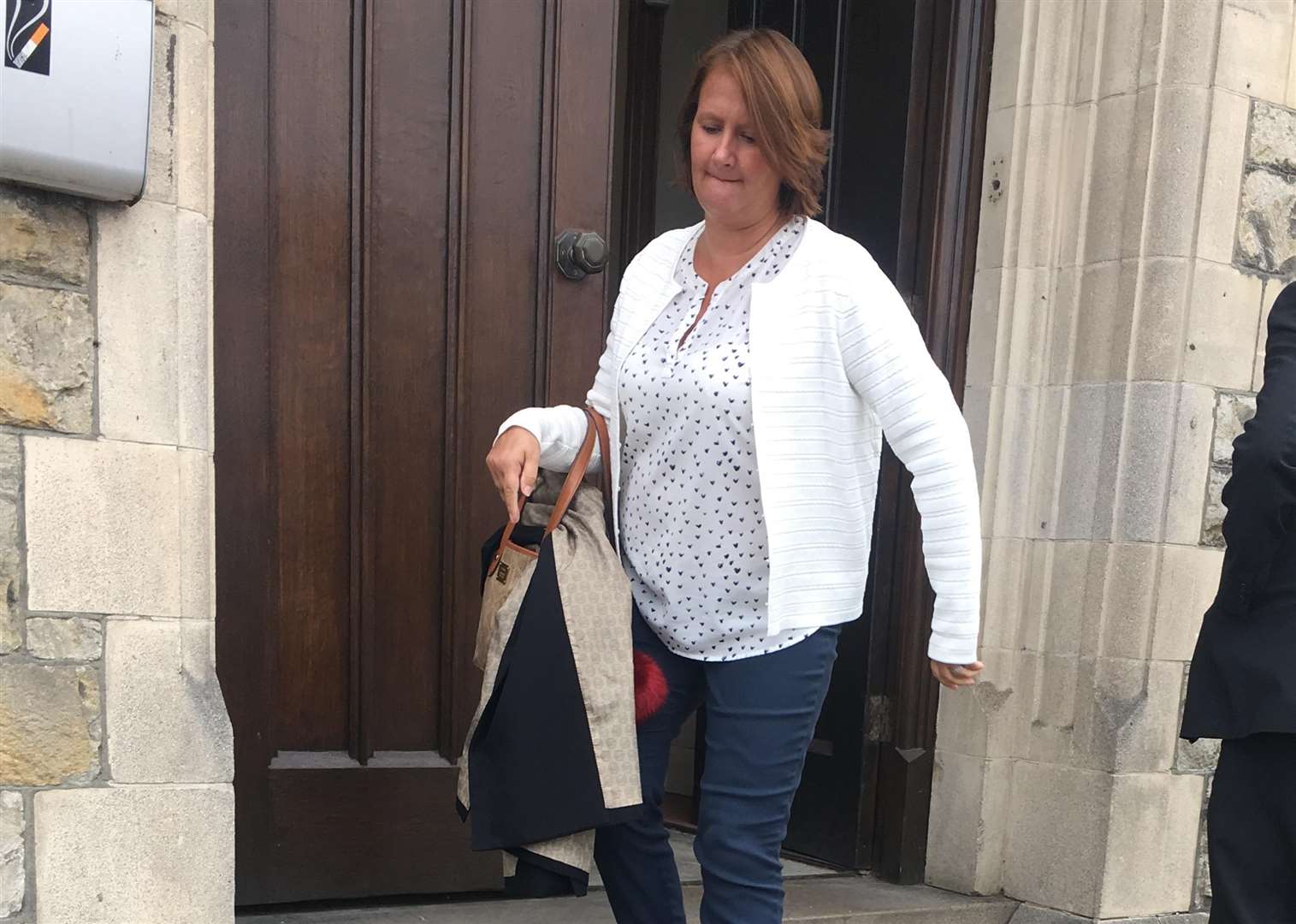 Jane Stockford leaves Maidstone Magistrates Court after receiving a suspended prison sentence