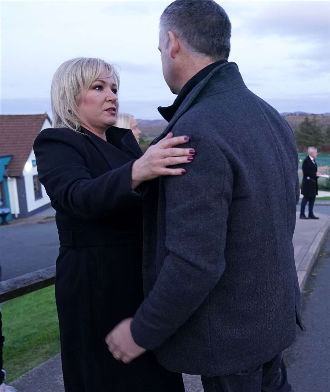 Sinn Fein deputy leader Michelle O’Neill with Sinn Fein TD for Donegal South West, Pearse Doherty, at the scene of the explosion (Brian Lawless/PA)