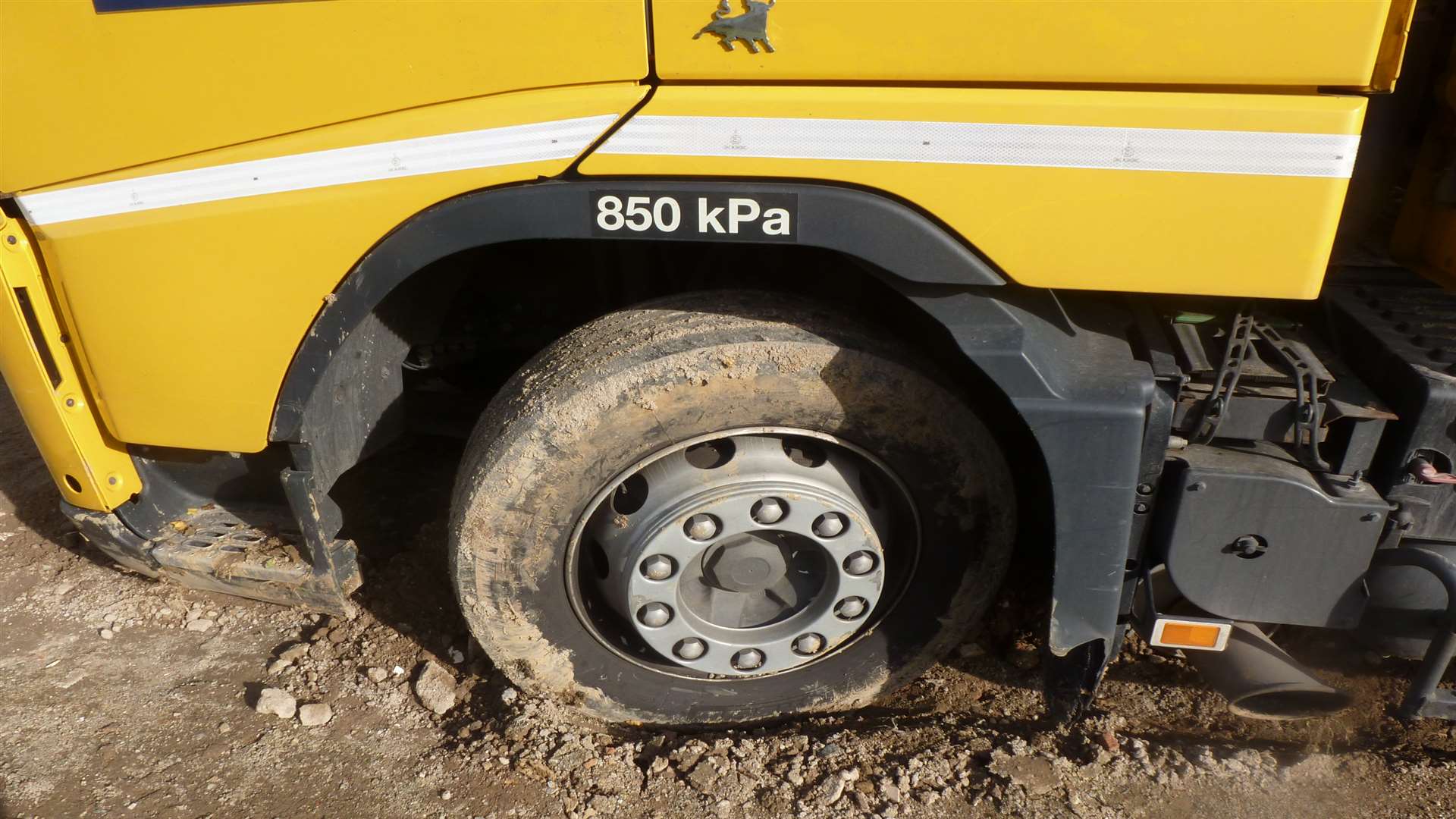 A front wheel of the Waberer's International lorry stuck in mud
