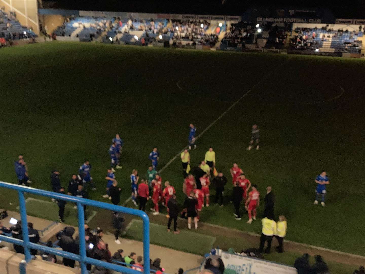 The players await instructions as the lights go out at Priestfield